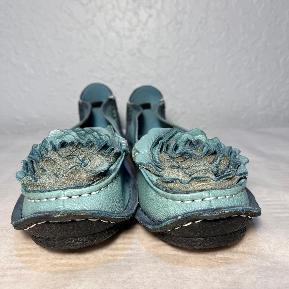 Elegant Teal Leather Moccasins with Floral Accents